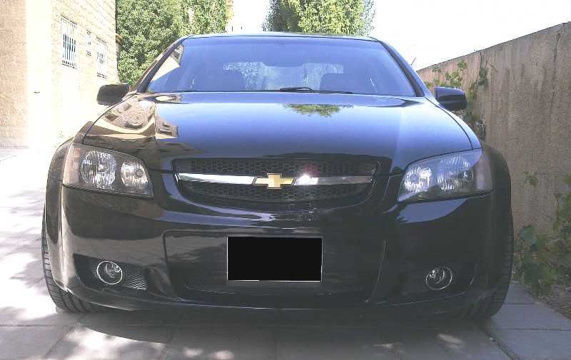 I'm driving a black V6 Chevy badged Lumina Modifications completed