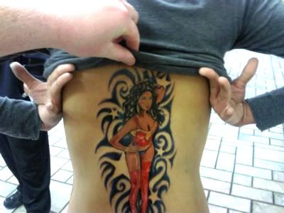  decided to get a picture of wonder woman minaj tattooed on her back!