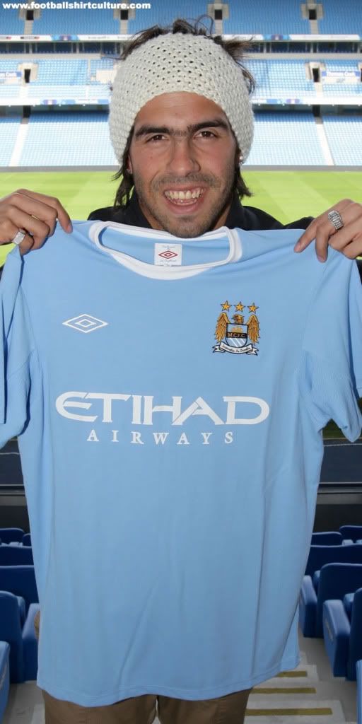 manchester-city-09-10-home-kit-umbr.jpg