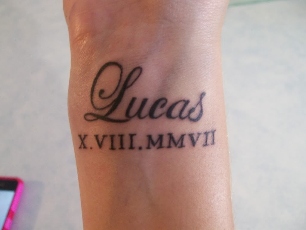 I got my sons name and date of birth in roman numerals on my right wrist