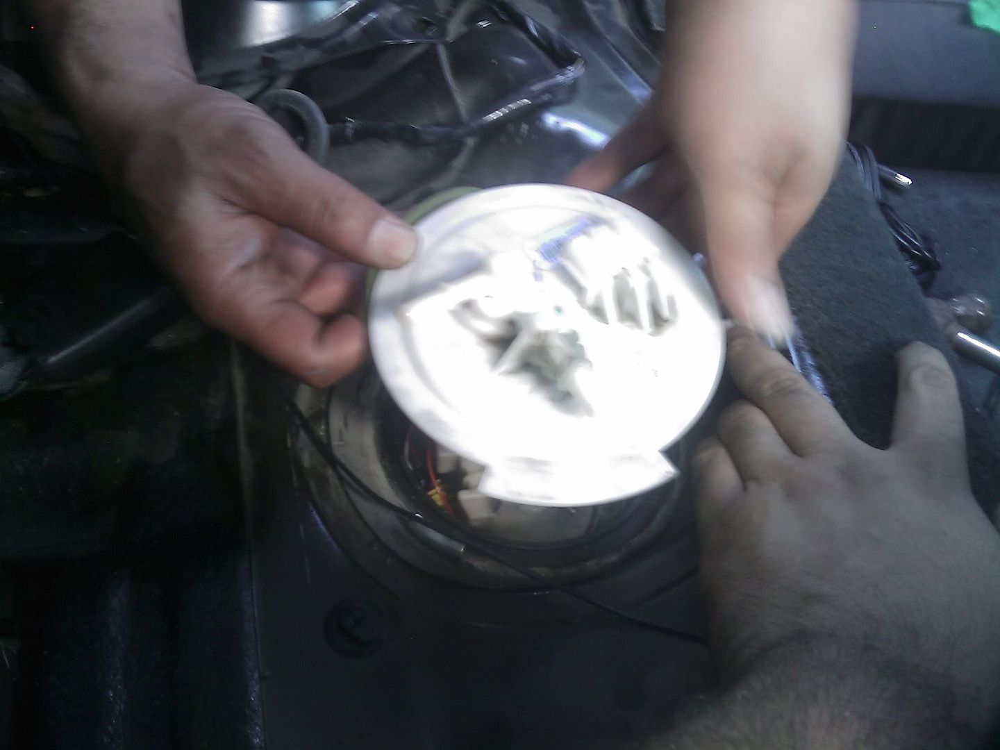 Nissan versa fuel pump removal #2