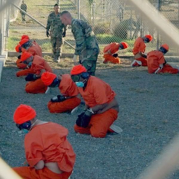 https://i274.photobucket.com/albums/jj256/Dilbert_X/599px-Camp_x-ray_detainees.jpg