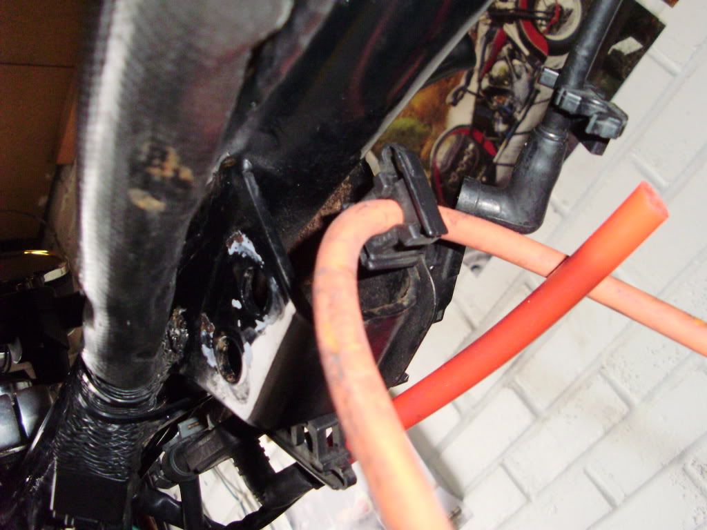 Under the seat (after the ignition module has been removed):